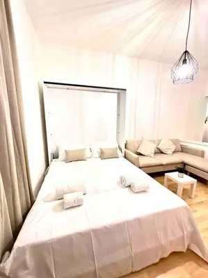 Letto o letti in una camera di Trilocale Via Palazzuolo- Firenze