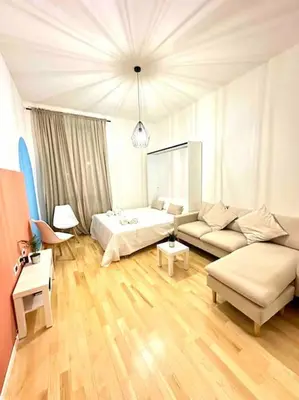 Letto o letti in una camera di Trilocale Via Palazzuolo- Firenze
