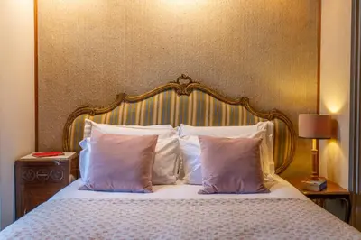 Letto o letti in una camera di Golden Renaissance