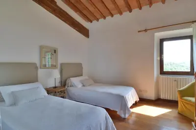 Letto o letti in una camera di Fattoria il Leccio - Elegant Suite on Florence Hills