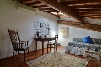 Area soggiorno di Fattoria il Leccio - Elegant Suite on Florence Hills