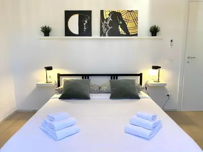 Letto o letti in una camera di Florence Apartment 10 min dal centro-50 mt tram