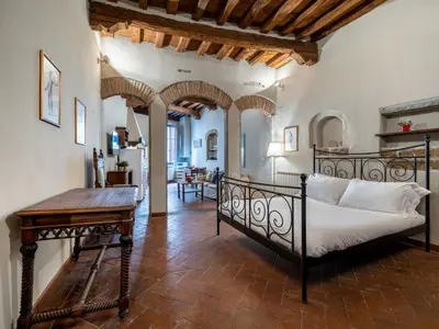 Letto o letti in una camera di Santa Croce Junior Suite - Dolcevita Holiday