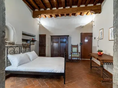 Letto o letti in una camera di Santa Croce Junior Suite - Dolcevita Holiday