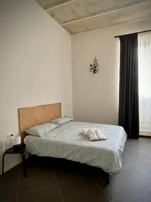 Letto o letti in una camera di Casa nel cuore di Firenze-Interno1