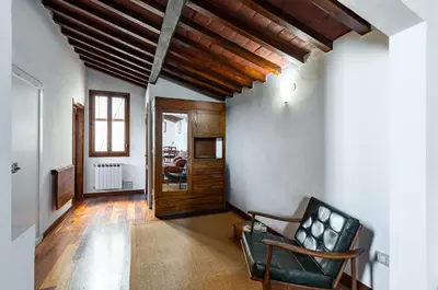 Area soggiorno di GuestHost - The Florentine Rooftop - Santo Spirito Experience