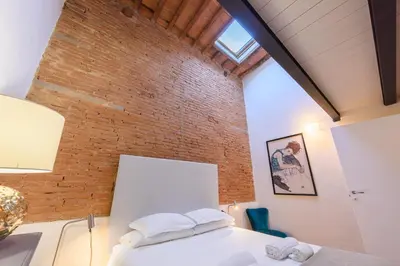 Letto o letti in una camera di Terrace on the roofs by Mmega