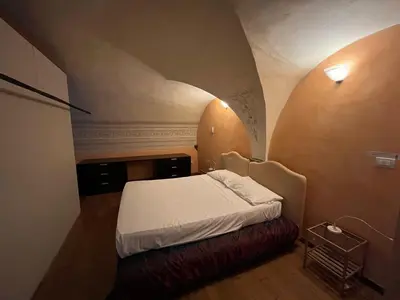 Letto o letti in una camera di Appartamento in centro storico-Borgo Albizi 27