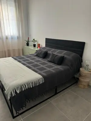 Letto o letti in una camera di The Savonarola Apartment