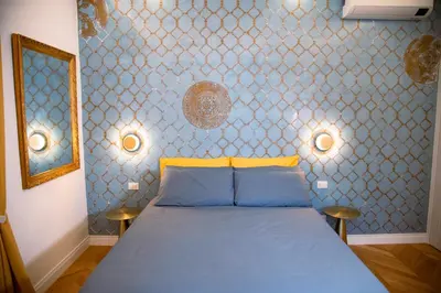 Letto o letti in una camera di Casa Michelazzi Apartment Careggi / Dalmazia