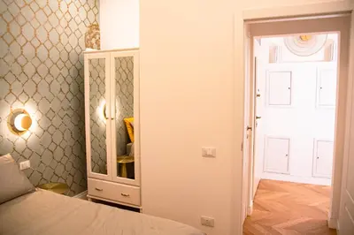 Letto o letti in una camera di Casa Michelazzi Apartment Careggi / Dalmazia