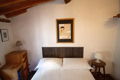 Letto o letti in una camera di Santo Spirito apartment