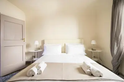 Letto o letti in una camera di [Piazza Pitti]Luminoso Appartamento con Terrazzo e Parcheggio su richiesta