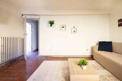 Area soggiorno di [Piazza Pitti]Luminoso Appartamento con Terrazzo e Parcheggio su richiesta