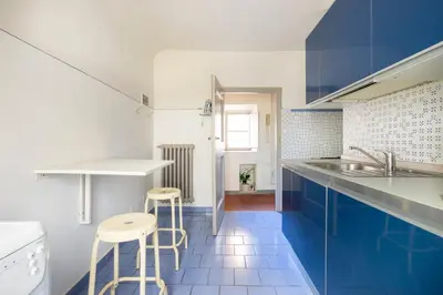 Cucina o angolo cottura di [Piazza Pitti]Luminoso Appartamento con Terrazzo e Parcheggio su richiesta
