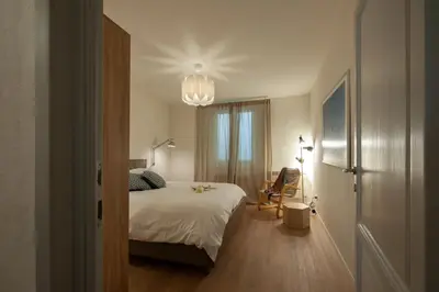 Letto o letti in una camera di Canto Rivolto - Flo Apartments