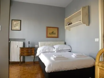 Letto o letti in una camera di Florence Views & Terrace, Easy Transport Access
