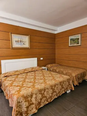 Letto o letti in una camera di Toscani da sempre