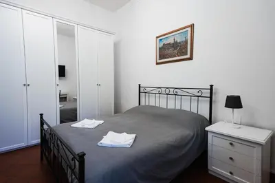 Letto o letti in una camera di Charming Home with exclusive courtyard in center of Florence