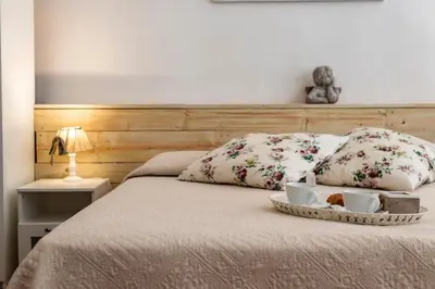 Letto o letti in una camera di B&B San Remigio