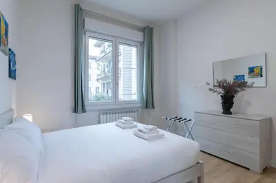 Letto o letti in una camera di Family Chich Suite in Florence
