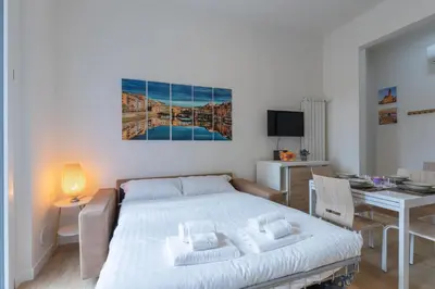 Letto o letti in una camera di Family Chich Suite in Florence