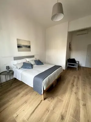 Letto o letti in una camera di Rusciano Park Apartment