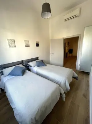 Letto o letti in una camera di Rusciano Park Apartment