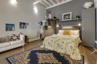 Letto o letti in una camera di Santo Spirito Studio Flat