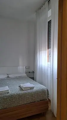 Letto o letti in una camera di CasaLory Rent Apartment Florence