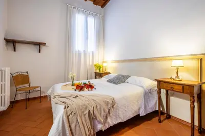 Letto o letti in una camera di San Giovanni Apartment