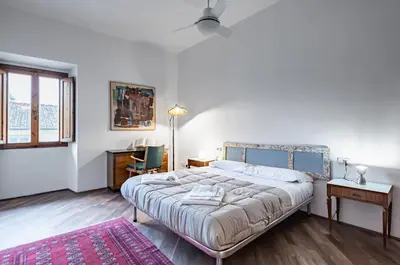 Letto o letti in una camera di GuestHost - Beccaria & Sant'Ambrogio Lovely Apartment