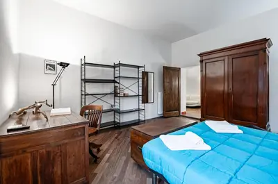 Letto o letti in una camera di GuestHost - Beccaria & Sant'Ambrogio Lovely Apartment