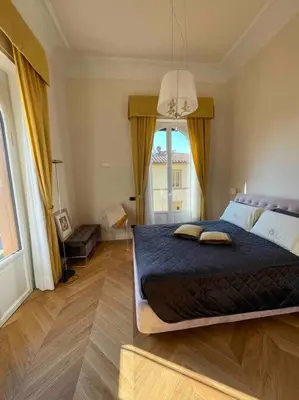 Letto o letti in una camera di Caterina de' Medici luxury attic with terrace and parking