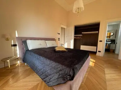 Letto o letti in una camera di Caterina de' Medici luxury attic with terrace and parking