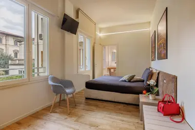 TV o dispositivi per l'intrattenimento presso Lucy Florence charming modern apartment near Piazza della Libertà
