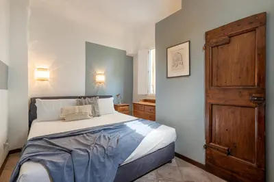 Letto o letti in una camera di Art Escape
