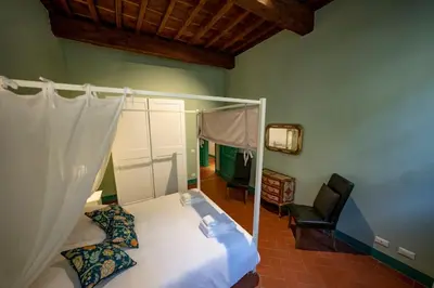Letto o letti in una camera di Raffinato trilocale San Frediano