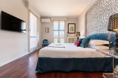 Letto o letti in una camera di Apartments Florence - Luxury River with Terrace