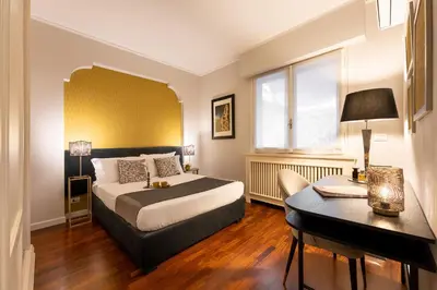 Letto o letti in una camera di Apartments Florence - Luxury River with Terrace