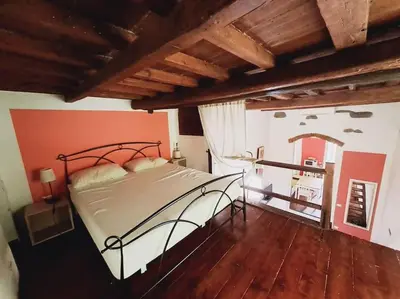 Letto o letti in una camera di B&B Essevu SanGallo Casavacanze