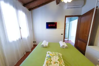 Letto o letti in una camera di La dimora verde in Santo Spirito