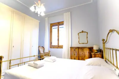 Letto o letti in una camera di Boccaccio Boutique Apartment
