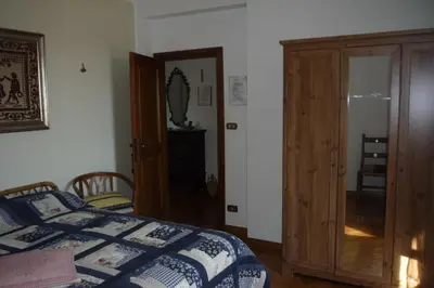 Letto o letti in una camera di Affittacamere DaMammaSara