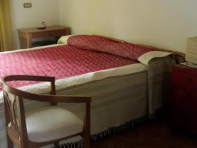Letto o letti in una camera di Affittacamere DaMammaSara