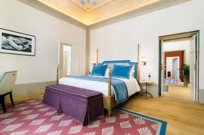 Letto o letti in una camera di Duca Marco-La Dimora degli Affreschi Florence