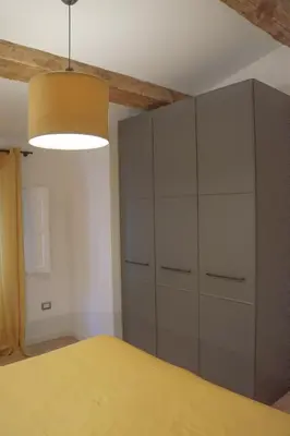 Letto o letti in una camera di Appartamento DV21