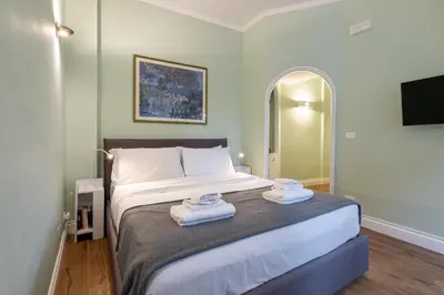 Letto o letti in una camera di The Tiny Barbadori