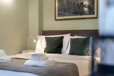 Letto o letti in una camera di The Tiny Barbadori