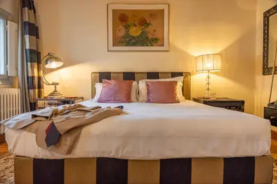 Letto o letti in una camera di L'Alcova di Giotto